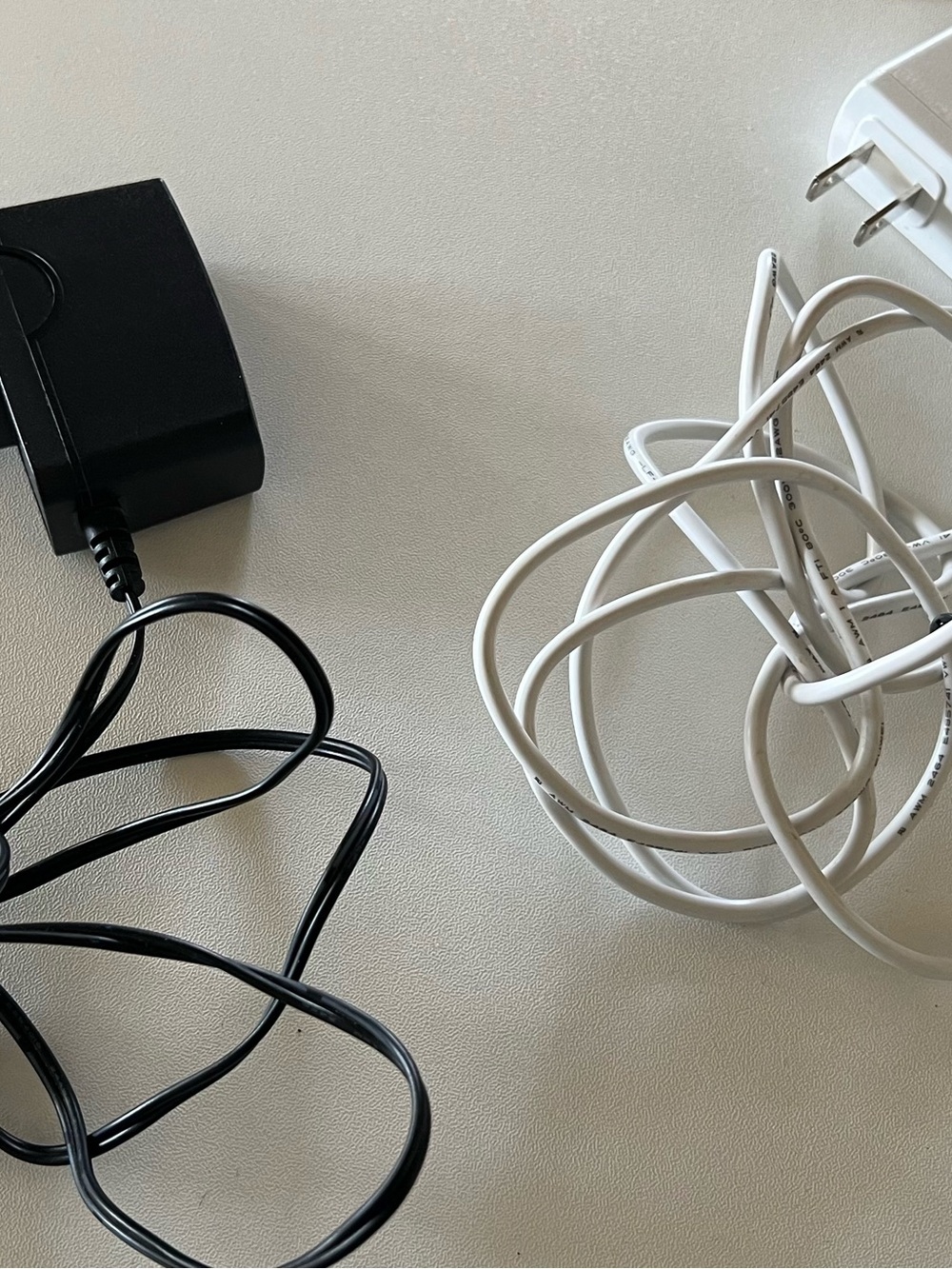 Black and White Cell Phone Charging Cables and Adapters
